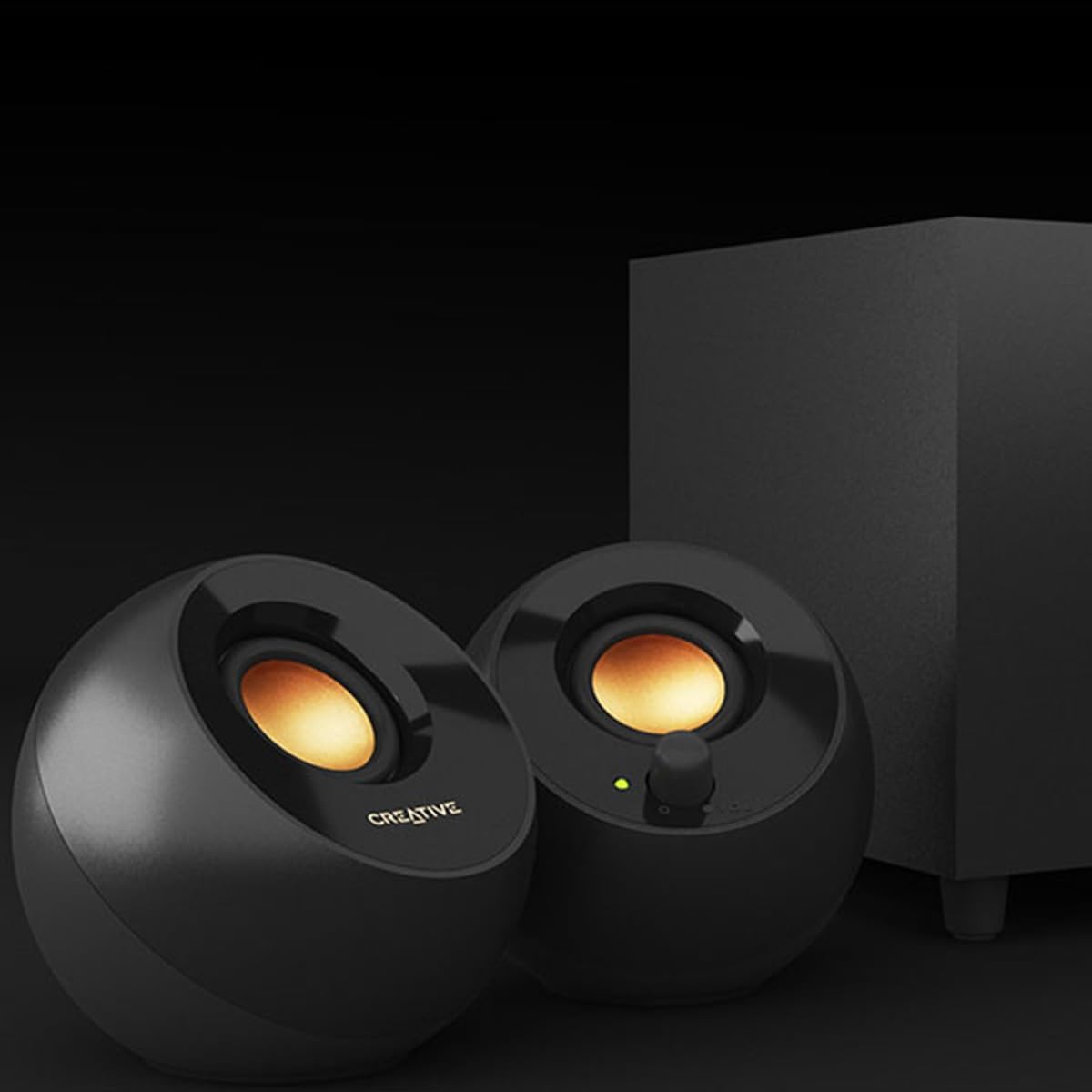 Black Creative pepper plus speakers with glowing lights on a dark background