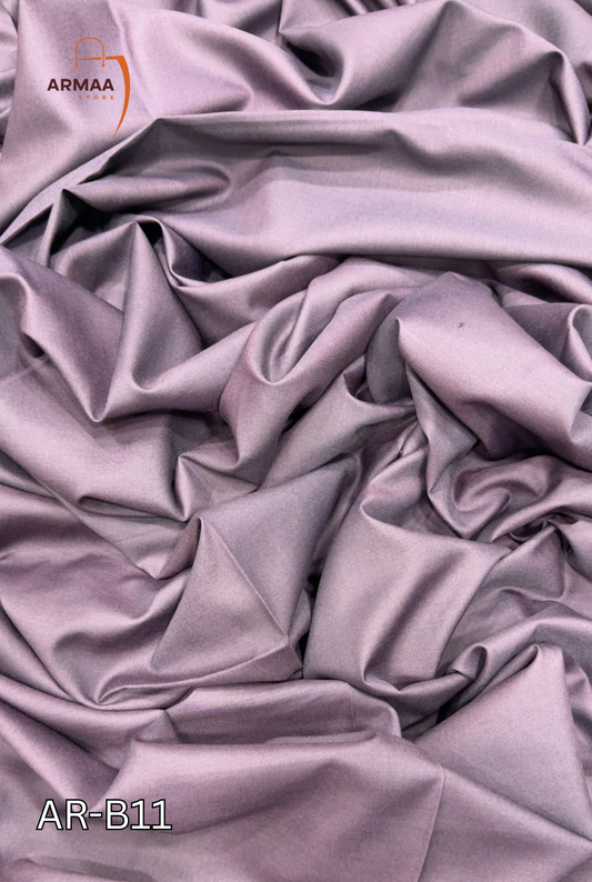 Close-up of crumpled purple fabric with 'ARMAA' branding.
