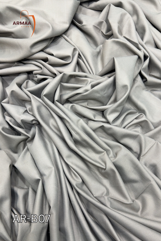 Close-up of gray fabric with 'ARMAA' branding and product code 'AR-B07'.