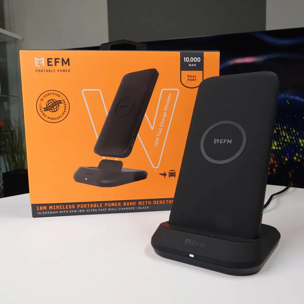 Black wireless charging pad with EFM branding on a white surface, next to an orange EFM product box.