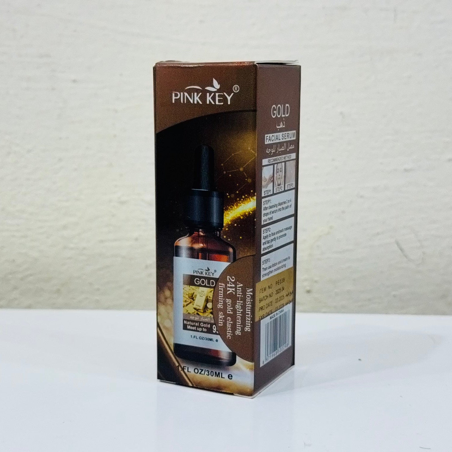 Pink Key Gold product packaging on a white background