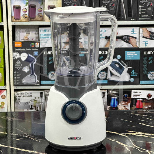 White blender on a store counter with product packaging in the background