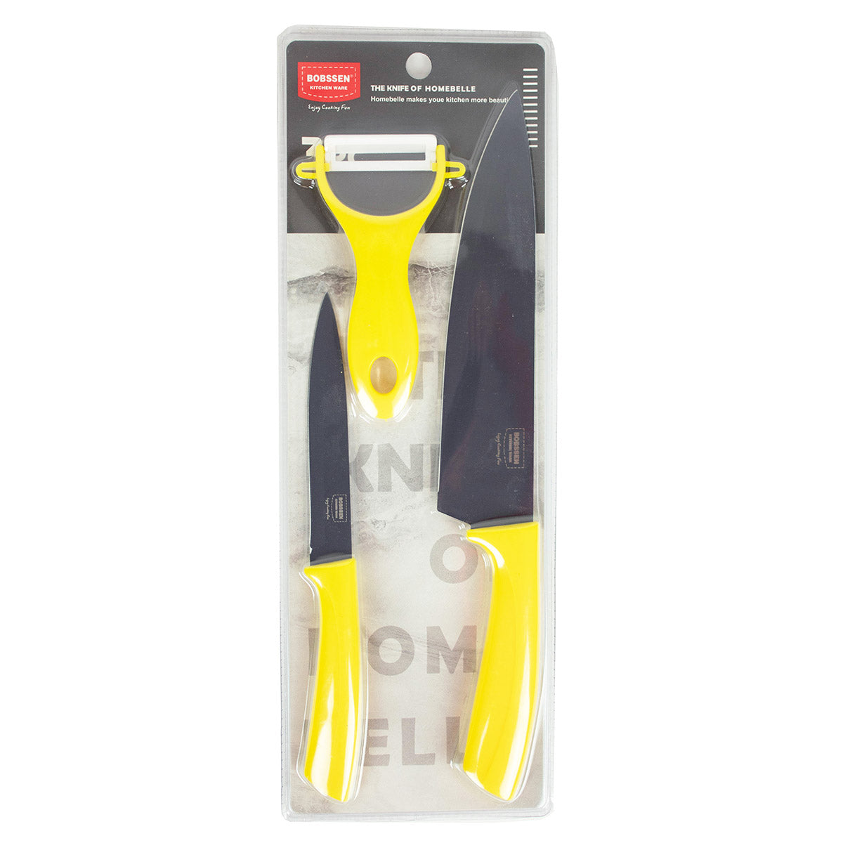 Set of knives with yellow handles in packaging on a white background