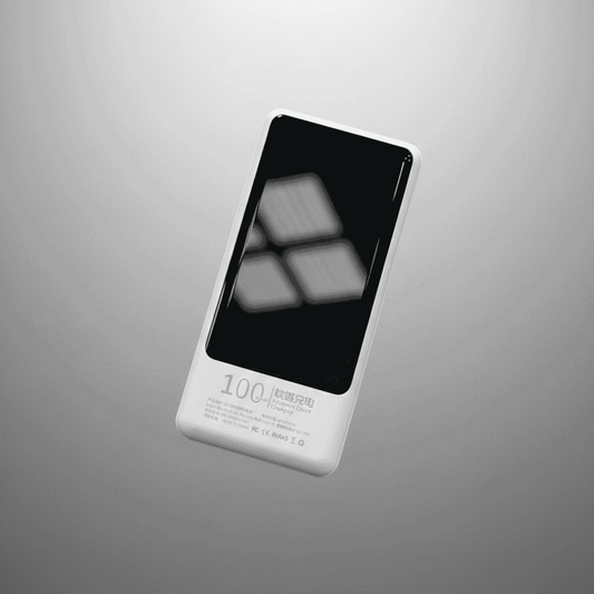 Digital camera on a reflective surface with a blurred background