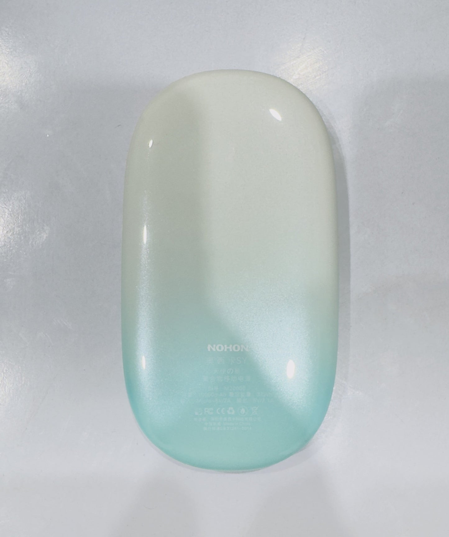 Gradient-colored phone case with 'HONOR' branding on a white background