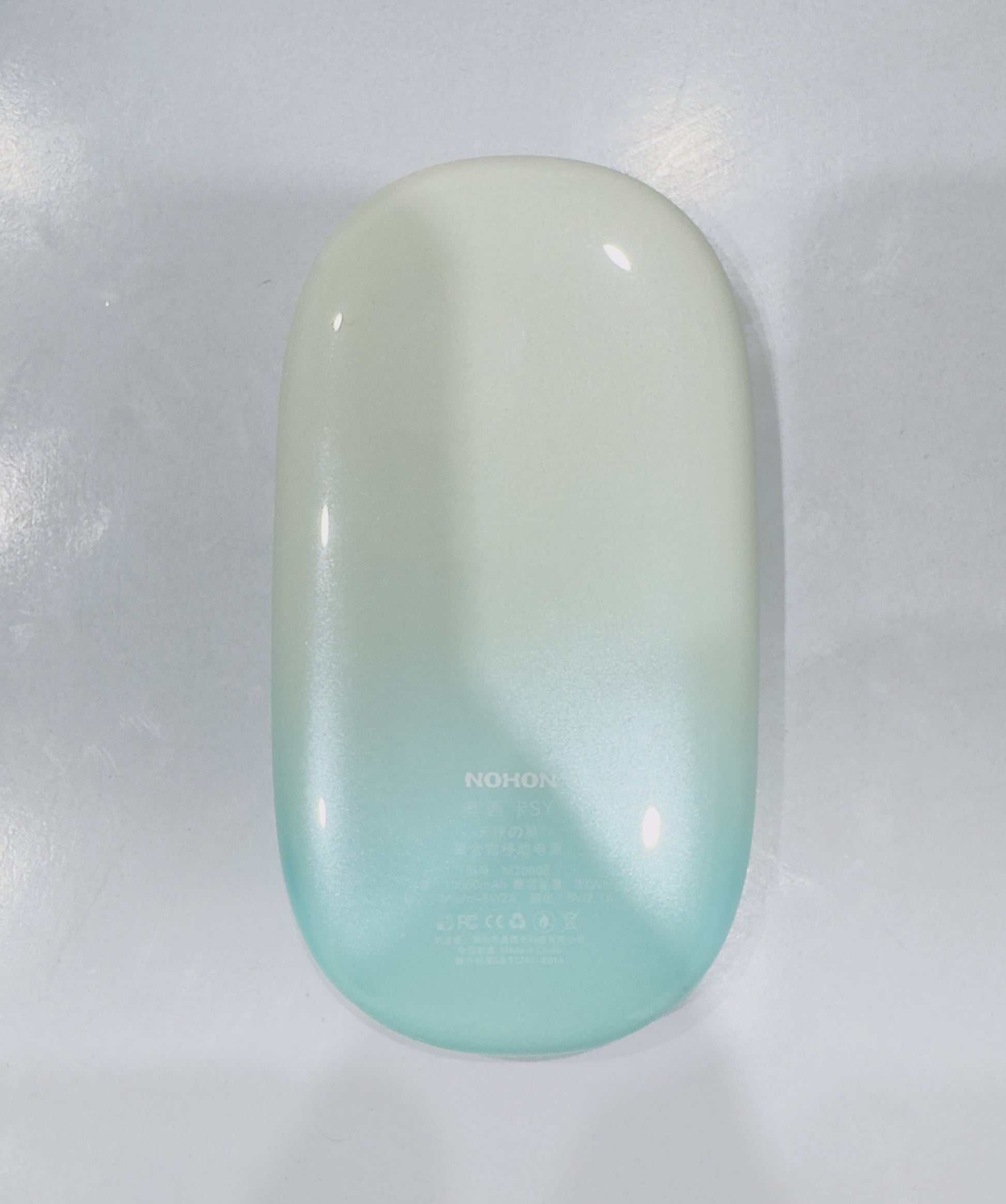 Gradient-colored phone case with 'HONOR' branding on a white background