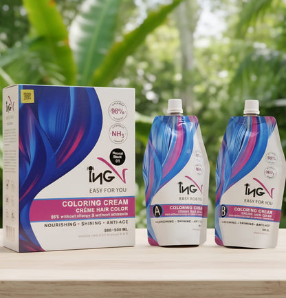 INGV hair coloring cream packaging with two bottles on a wooden surface with a blurred green leafy background