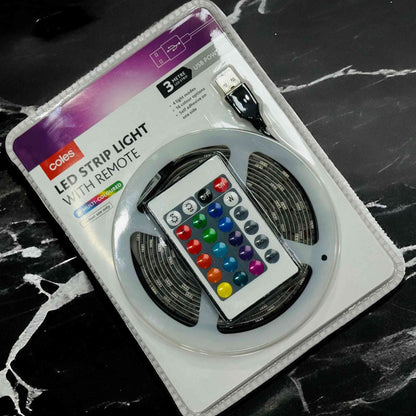 LED strip light with remote control on a black marble surface