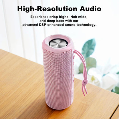 Pink portable speaker on a wooden surface with text about high-resolution audio.