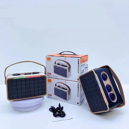 Portable speaker with packaging and accessories on a white background