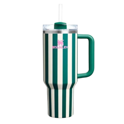 Green and white striped mug with handle and straw on a white background