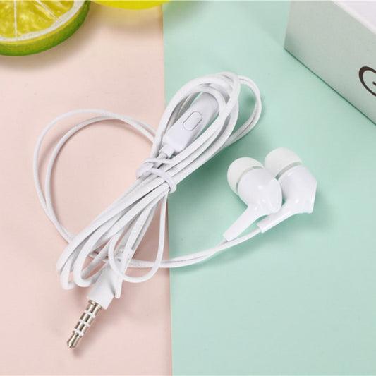 White earphones with a cable on a split pink and green background