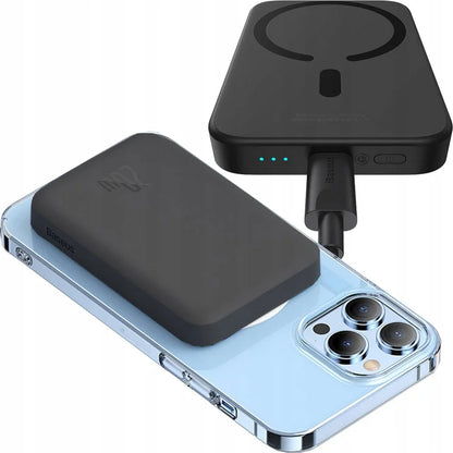 Wireless charging pad and receiver on a smartphone with a white background