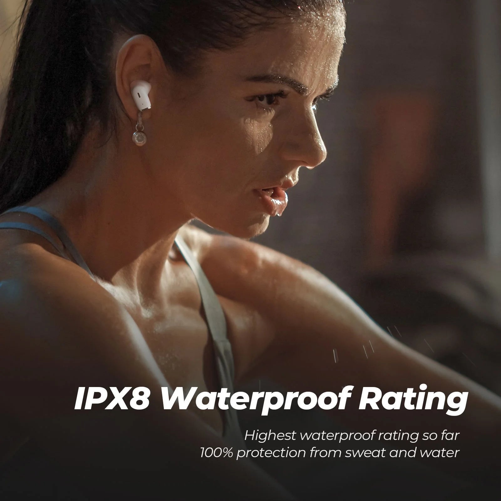 Woman wearing earbuds with text about IPX8 waterproof rating